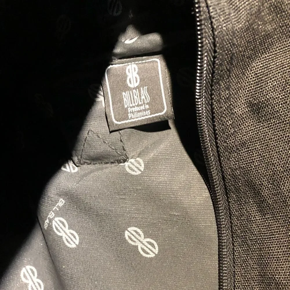Bill Blass Small Carry On Small Luggage Bag from a larger Set.